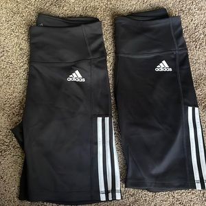 Two pairs of Adidas biker shorts